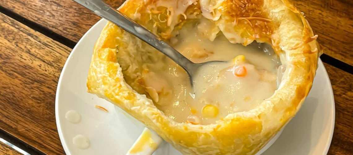 chicken pot pie soup, Zuppa toscana or bread or Tuscan or Minestra Pane or Zuppa soup. Made from kale, zucchini, beans, potatoes, celery, carrots, onion, tomato pulp, extra virgin olive oil, chili and chicken or bacon.