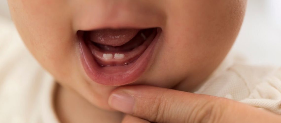 Newborn baby teeth of 0 year old